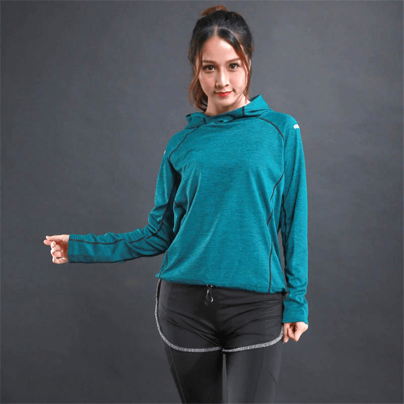 Woman wearing a teal sports women's thin long sleeves hoodie, ideal for gym fitness with reflective printing. Style: SF0097.